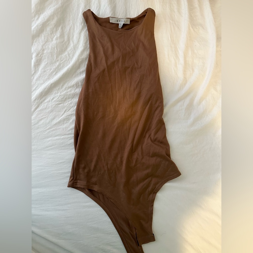 Brown body suit